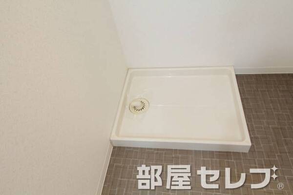 洗濯機置き場はこちらへ。