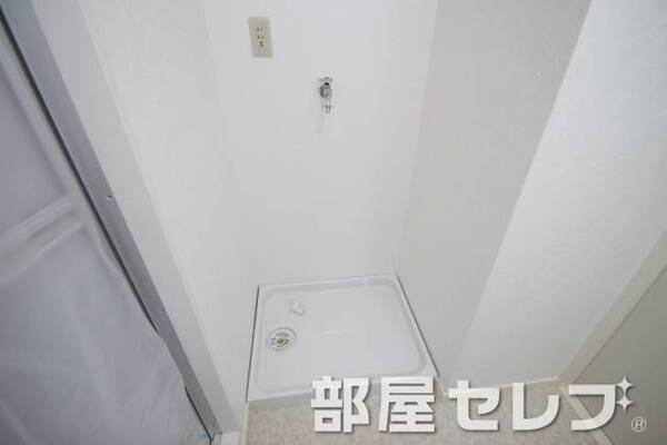 洗濯機置き場はこちらへ。