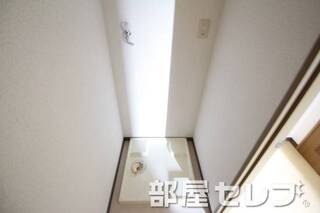 洗濯機置き場はこちらへ。