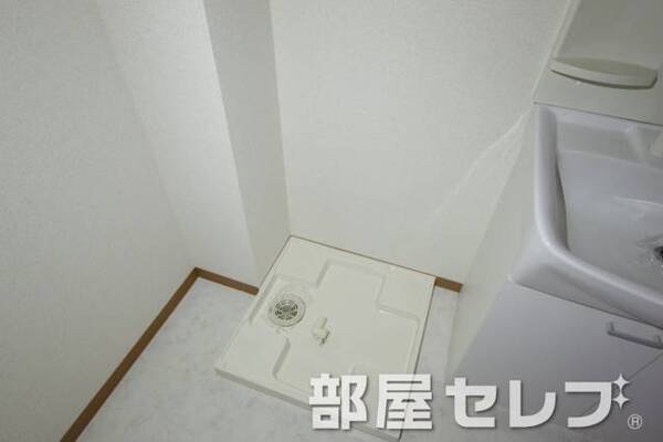 洗濯機置き場はこちらへ。