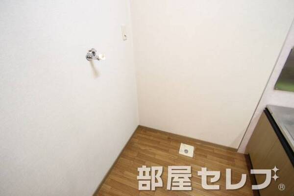 室内洗濯機置き場はこちらへ。