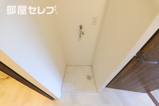 洗濯機はこちらへ。