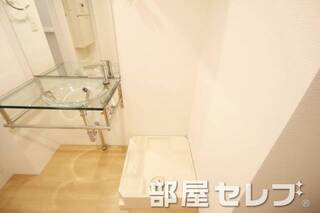 洗濯機置き場はこちらへ。
