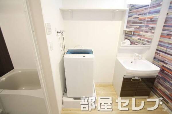 洗濯機置き場はこちらへ。