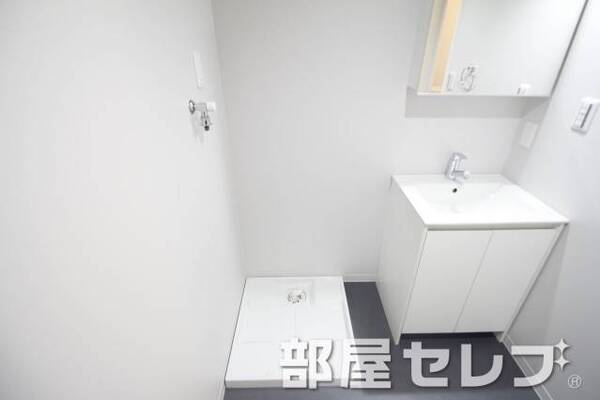 洗濯機置き場はこちらへ。