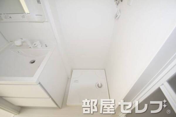 洗濯機置き場はこちらへ。