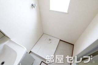 洗濯機置き場はこちらへ。
