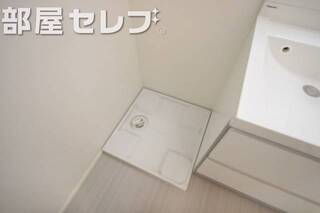 洗濯機はこちらへ。