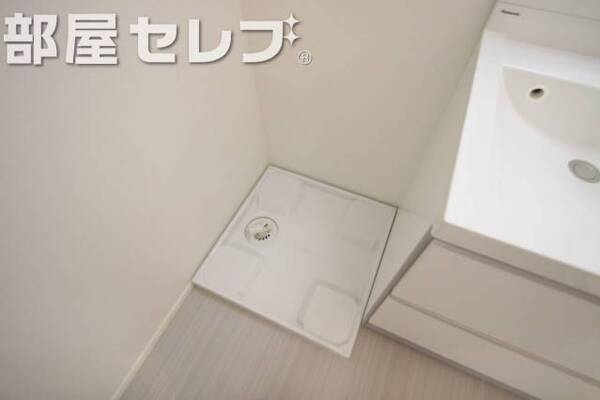 洗濯機はこちらへ。