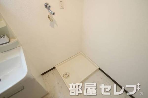洗濯機置き場はこちらへ。