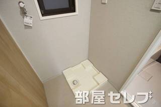 洗濯機置き場はこちらへ。