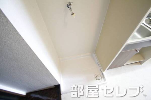洗濯機置き場はこちらへ。