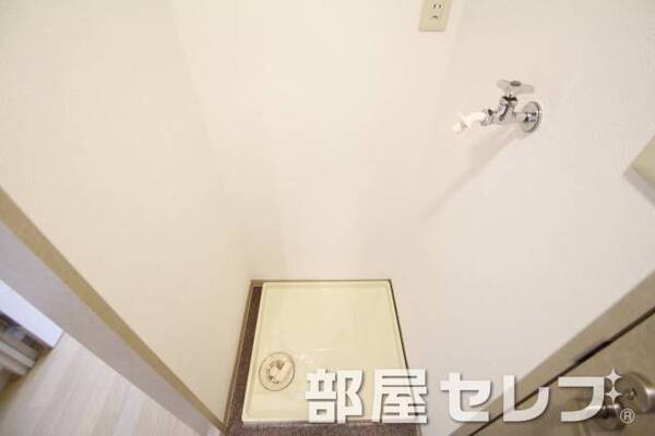 洗濯機置き場はこちらへ。