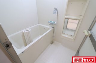 Ｌの字3口コンロ付システムキッチン。