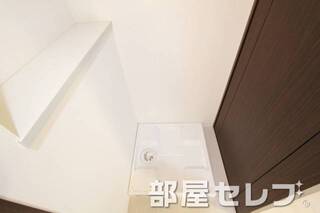 洗濯機置き場はこちらへ。