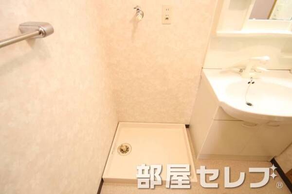 洗濯機置き場はこちらへ。
