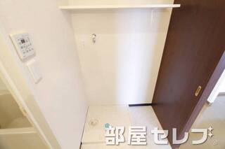 洗濯機置場はこちらへ。