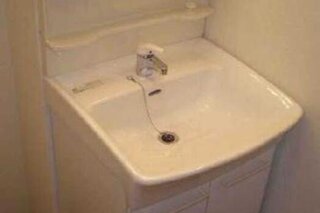 ウォシュレット付きのお手洗いです。102号室の写真です。