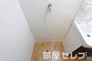 洗濯機置き場はこちらへ。