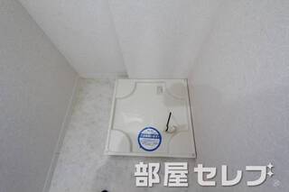 洗濯機置き場はこちらへ。