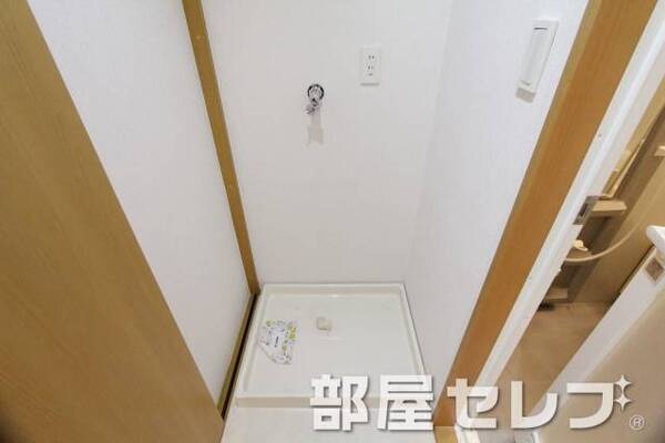 洗濯機置き場はこちらへ。
