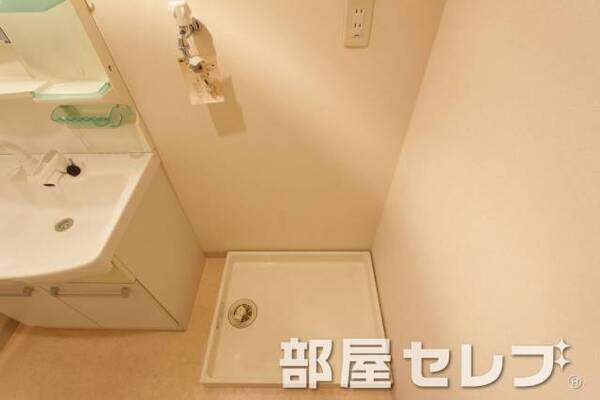 洗濯機置き場はこちらへ。