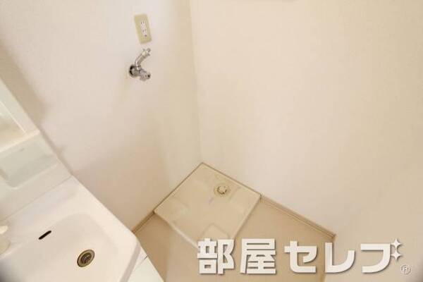 洗濯機置き場はこちらへ。