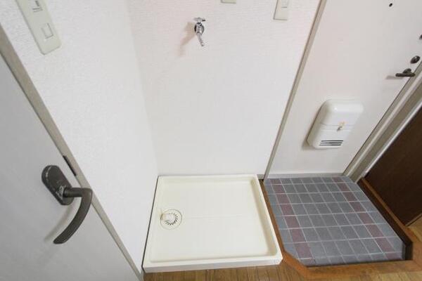 洗濯機はこちらに。