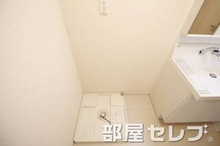 洗濯機置場はこちらへ。